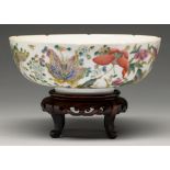 A Chinese famille rose bowl, 20th c, enamelled with butterflies and other insects, lotus and prunus,