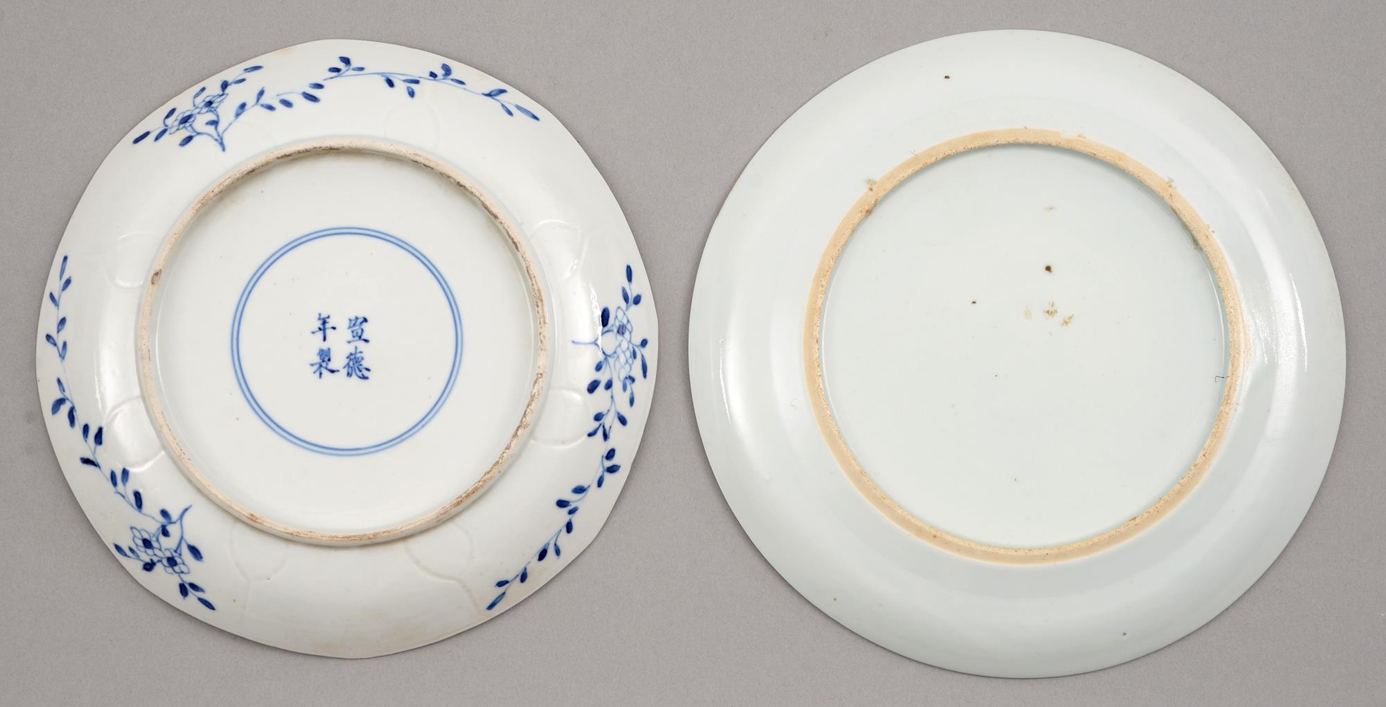 Two Chinese blue and white plates, 18th and 19th c, painted with flowering plants in panelled border - Image 2 of 2