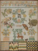 A linen sampler dated 1760, embroidered in various stitches with a bird on a branch, peacock,