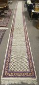 A large Indian Kaimuri woollen hall runner carpet rug.