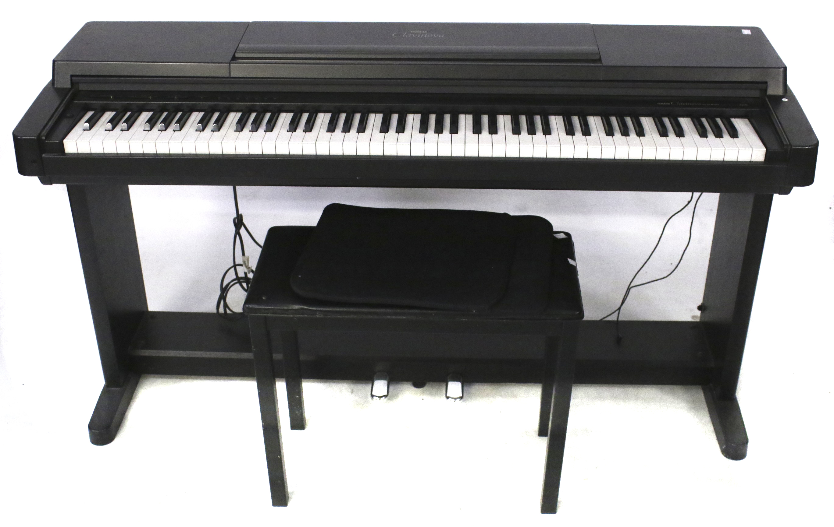 A Yamaha Clavinova CLP-550 electronic piano. S/n. 27117 with stand, stool.