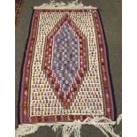 A contemporary woven rug.