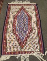 A contemporary woven rug.