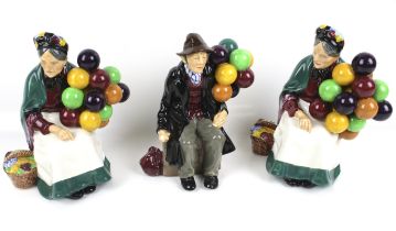 Three Royal Doulton figures.