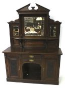 A Victorian mahogany sideboard dresser with mirrored back.