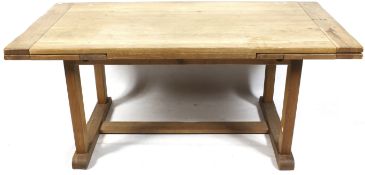 A late 20th century oak draw leaf refectory table by Willis and Gambier.