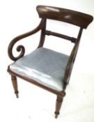 A Regency style Victorian mahogany carver chair.