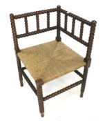 A 19th centuy oak bobbin turned corner chair.