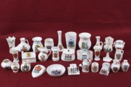 A collection of assorted vintage crested chinaware. By various makers including Goss, Max. H9.