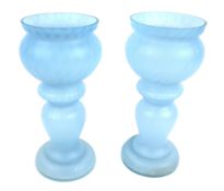 A pair of 19th century blue glass vases.