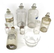 A collection vintage chemist, Apothecary, pharmaceutical glass jars and a stoneware bottle.