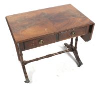 A mahogany Regency style occasional table. Of small sofa table form with frieze drawers.