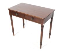 A Victorian mahogany hall table. With two drawers, raised on turned supports, H75cm x W91.5cm x D51.