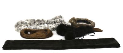 A collection of vintage fur and faux fur accessories. Including stoles, collars, etc.