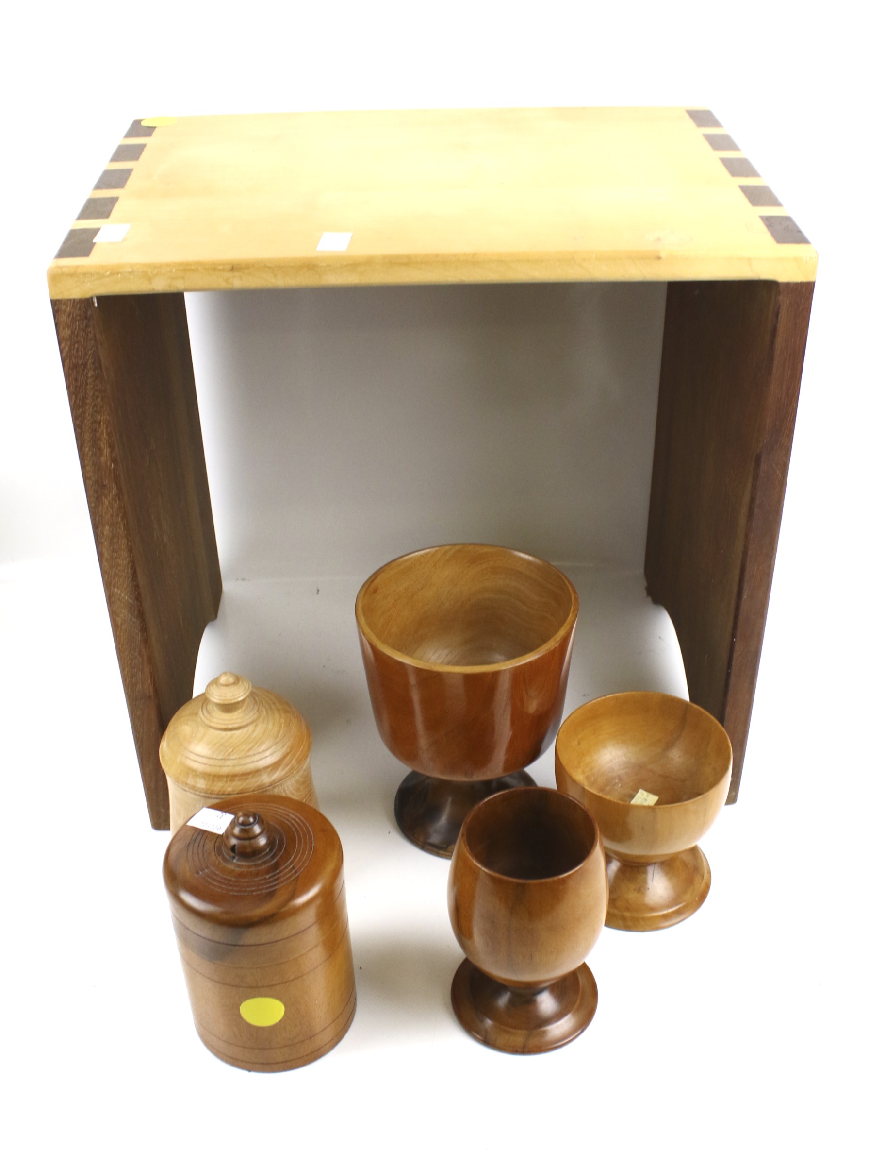 Treen ;An assortment of fruitwood items and a table. Including lidded pots, goblets, etc.