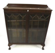 A mahogany display cabinet.