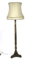 An early 20th century mahogany and gilded standard lamp.