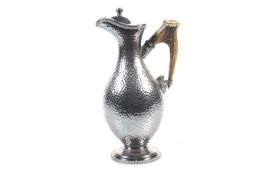 A Victorian silver plate pedestal claret jug.