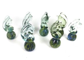 Seven Mdina Maltese glass paperweights.