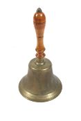 A large Victorian hand bell. With turned shaped wooden handle, H 37.5 cm x 22.