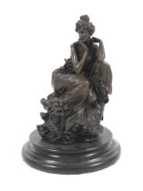 A 20th century patinated cast bronze sculpture of an Edwardian style lady.