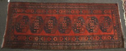 An early-mid 20 th century hand made woollen rug/carpet runner.
