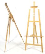 Two contemporary pine artists' easels. Including an adjustable Daler-Rowney example, Max.