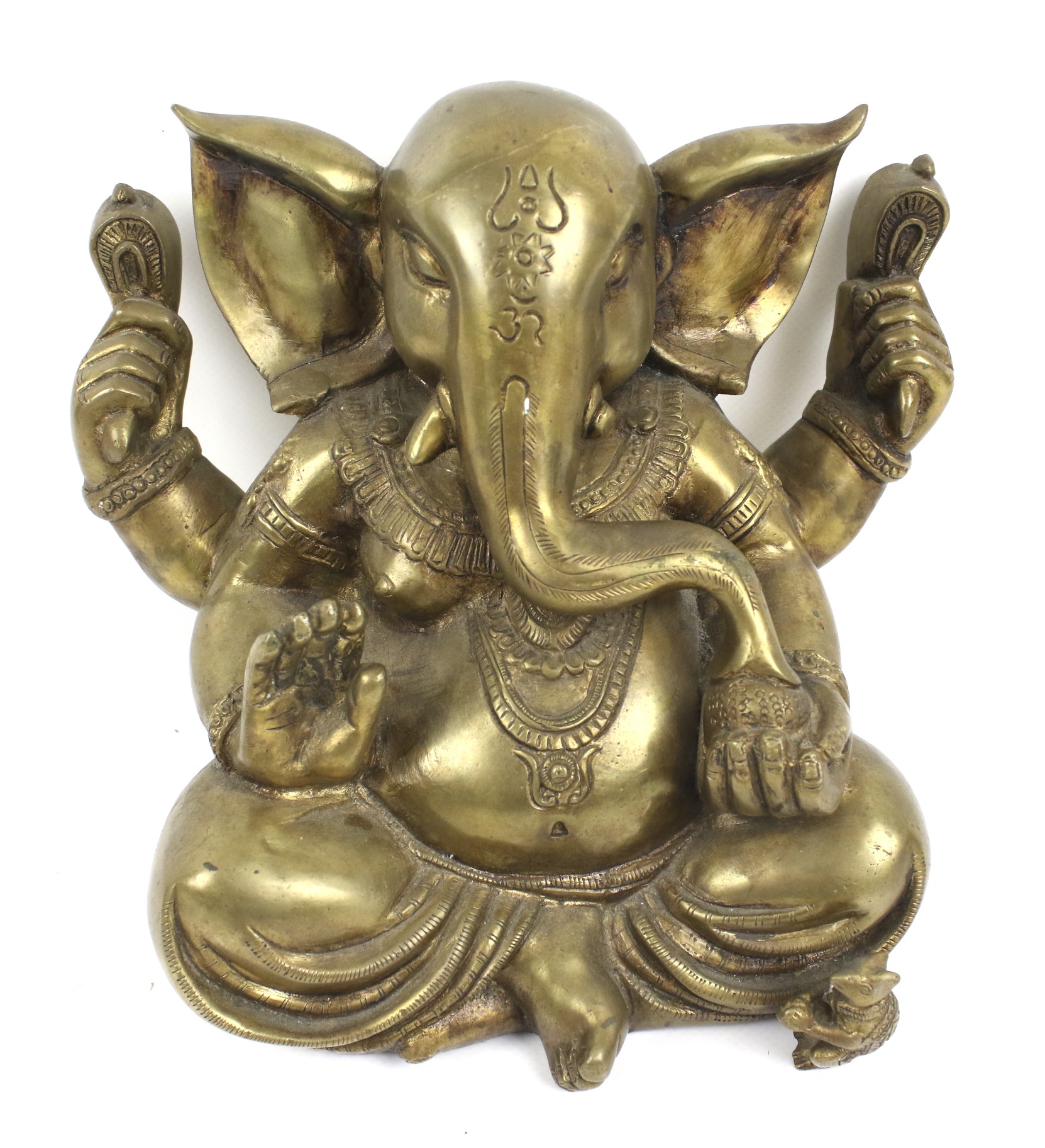 A cast brass sculpture of the Hindu elephant-headed God Ganesha.