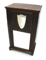 An Edwardian walnut music cabinet.