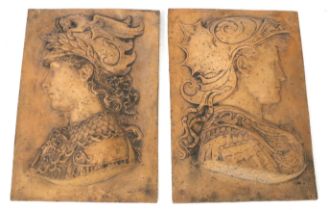 A pair of large ceramic tiles. Depicting young men sporting armour with mythical beast decoration.