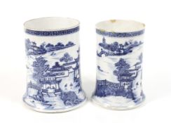 A near pair of 18th century Chinese blue and white export tankards.