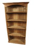 A contemporary pine bookcase.