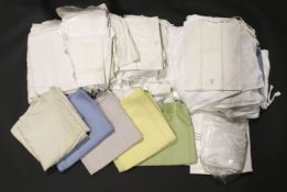 An assortment of 20th century linen and textiles.