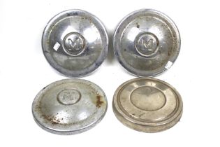 Automobilia : Three Morris Minor car hub caps and one other, all chromed.