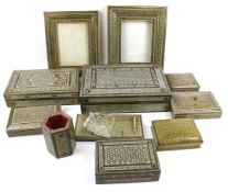 An assortment of wooden Middle Eastern boxes and picture frames.