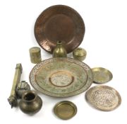 An assortment of Persian brass and copperware.