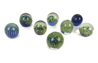 Eight (8) Mdina Maltese glass paperweights. Of spherical form, including four signed examples, Max.