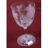 A circa 1900 etched clear glass pedestal wine glass.