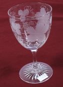 A circa 1900 etched clear glass pedestal wine glass.