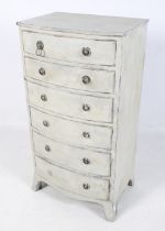 A Georgian style bow front chest of drawers.