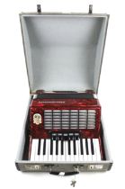 A Royal Standard piano accordian in case. S/N 30542/77.