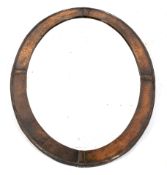 An early 20 th century copper framed oval wall mirror.