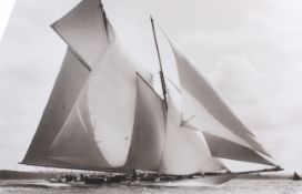 A large black and white print of a sailing boat 'Susanne 1910'.
