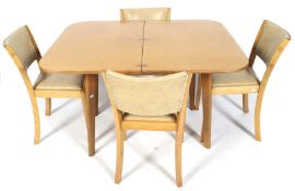 A mid-century Maples of London folding dining table and four matching chairs.