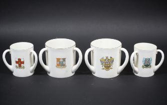 Four unusually large W H Goss loving cups.