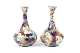 A pair of J. H. W. & Sons Falcon Ware vases.