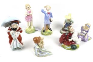 Seven Royal Doulton figures. Including 'He loves me', 'Mary has a Little Lamb, etc. Max.