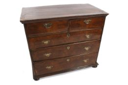 A George I walnut chest of drawers.