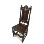 A 17 th century and later oak chair.