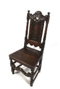 A 17 th century and later oak chair.